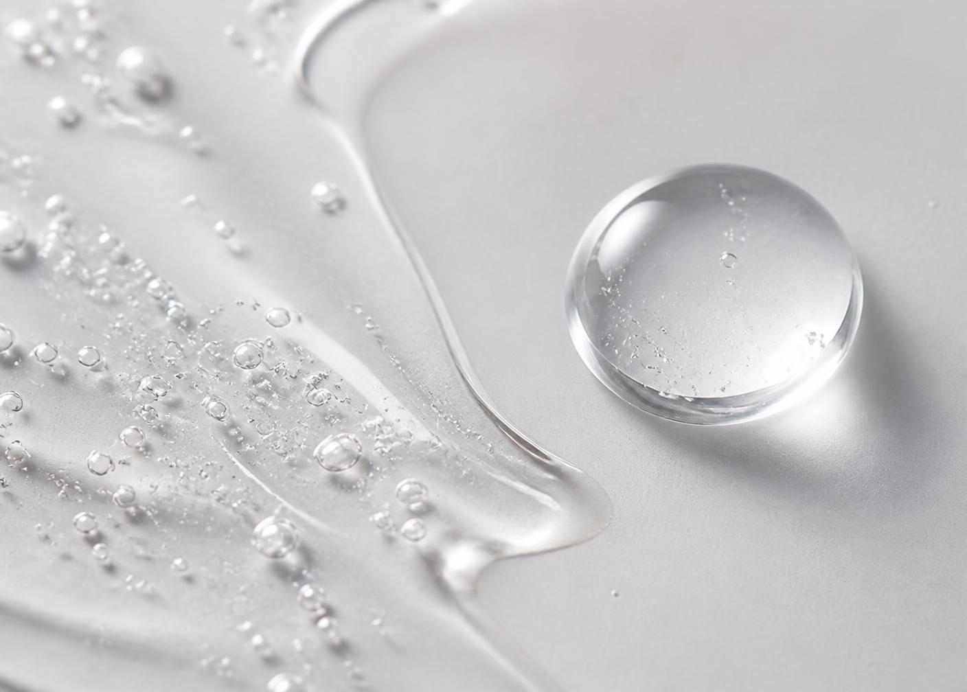Macro detail of the hydrogen-infused mist texture on a pale surface